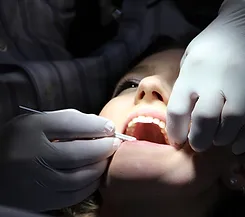 A beautiful woman undergoing a dental examination