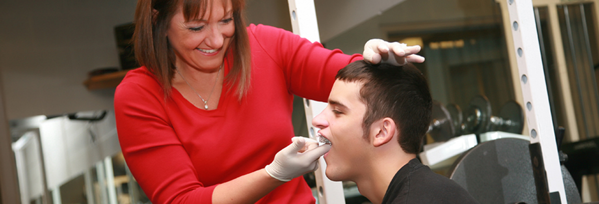 Patient undergoing dental exam at North Cedar Dental